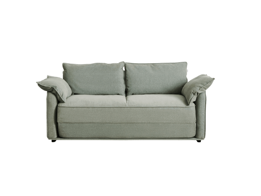 A light green, modern sofa with two back cushions and two armrest cushions, set against a black background.