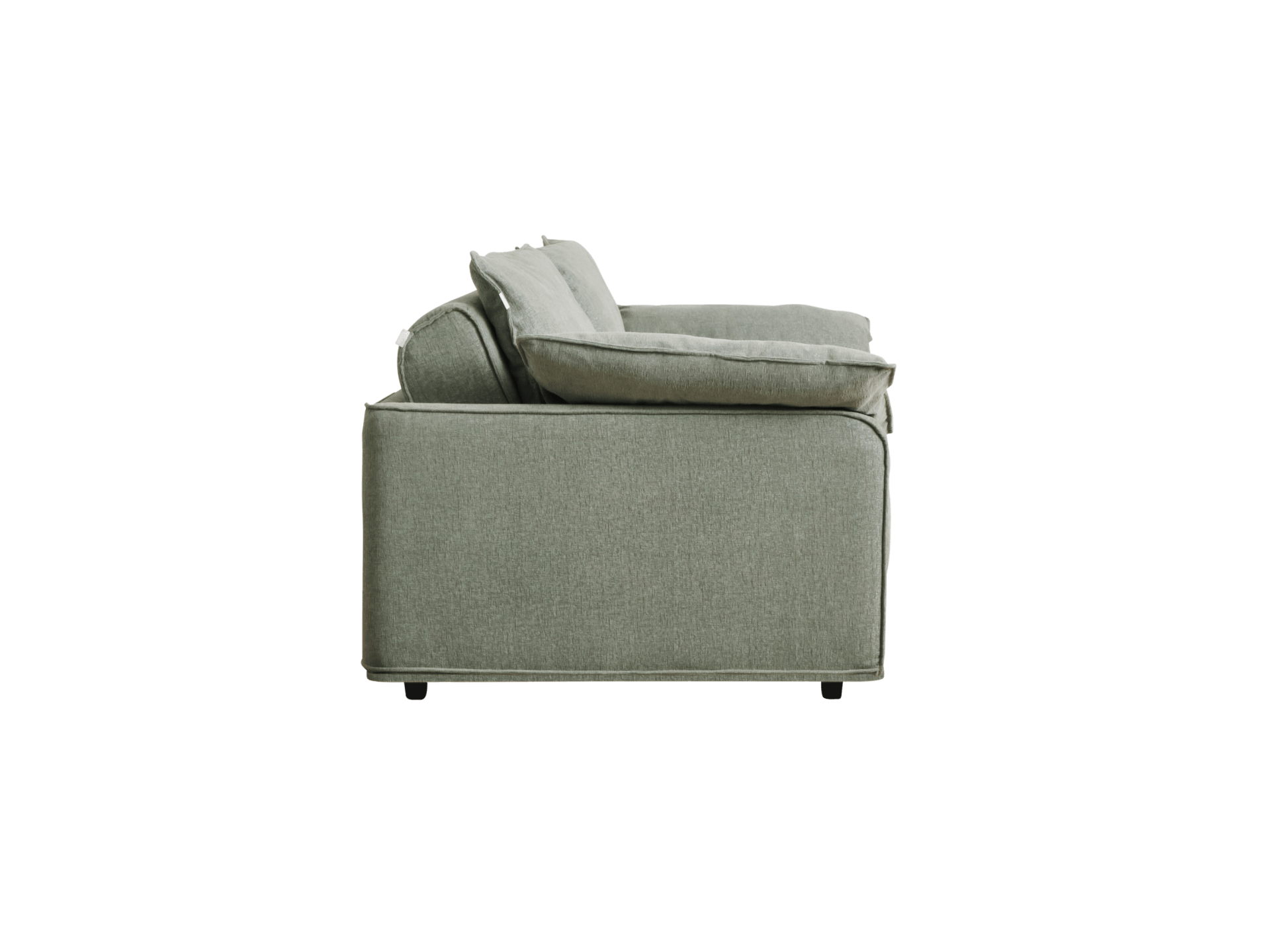 A side view of a light green sofa with two plush back cushions, sitting on black wheels against a black background.